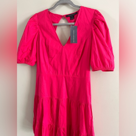 This hot pink Dress is all you need for the Summer. The beauty is in the back. - Picture 1 of 6